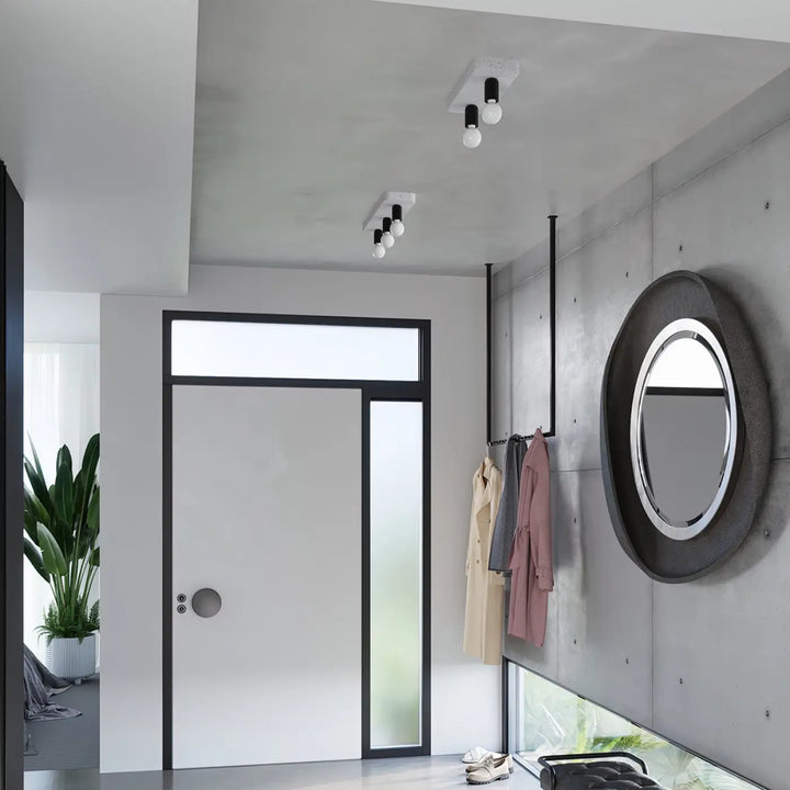 Plafonnier tavo 2 gris béton avec spots noirs et blancs au design moderne pour une ambiance unique et l’esthétique moderne