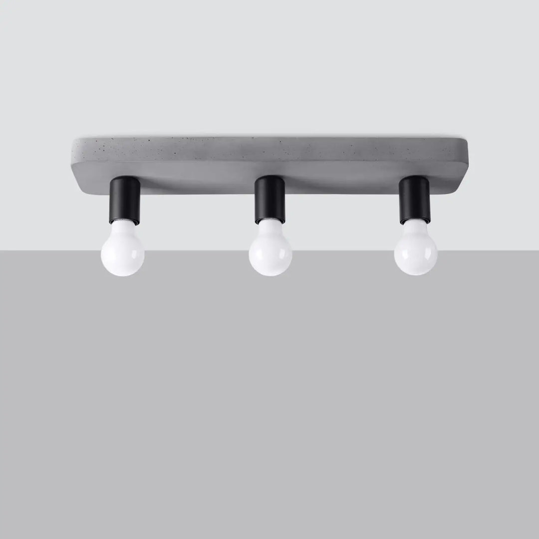 Plafonnier tavo gris béton en béton moderne avec trois douilles noires et ampoules en verre pour une ambiance unique