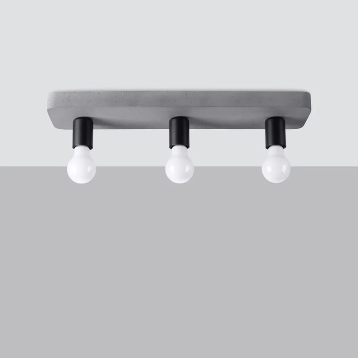 Plafonnier tavo gris béton en béton moderne avec trois douilles noires et ampoules en verre pour une ambiance unique