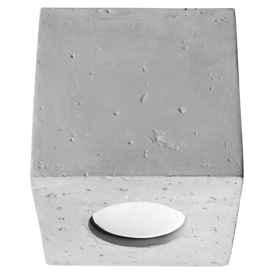 Plafonnier quad beton gris avec socle en béton et insertion ovale blanche lisse à la base