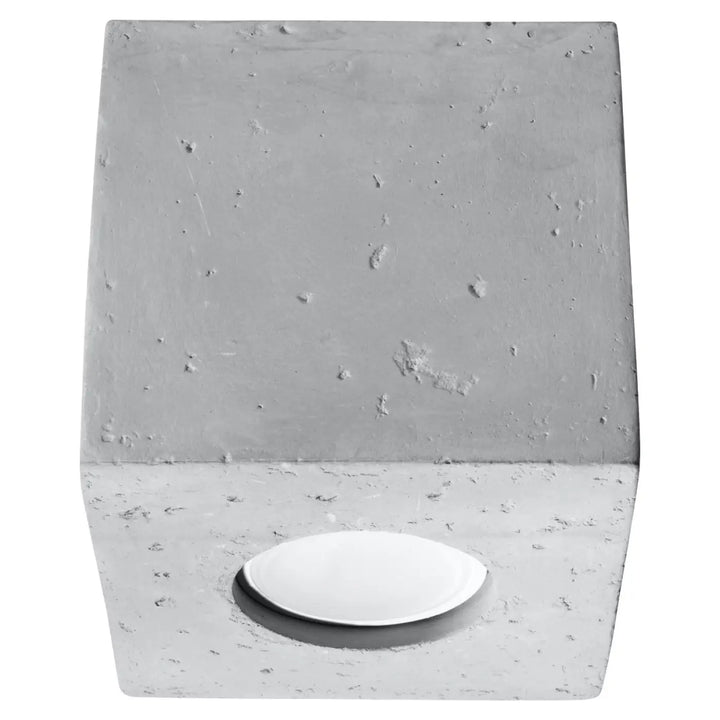 Plafonnier quad beton gris avec socle en béton et insertion ovale blanche lisse à la base