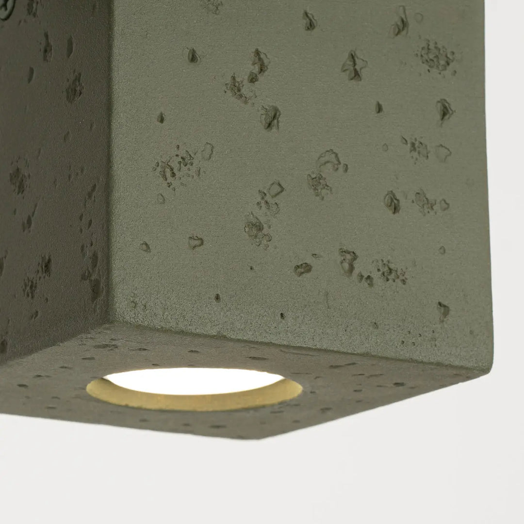 Applique murale plafonnier quad en béton vert olive avec forme originale et lumière circulaire encastrée chaude