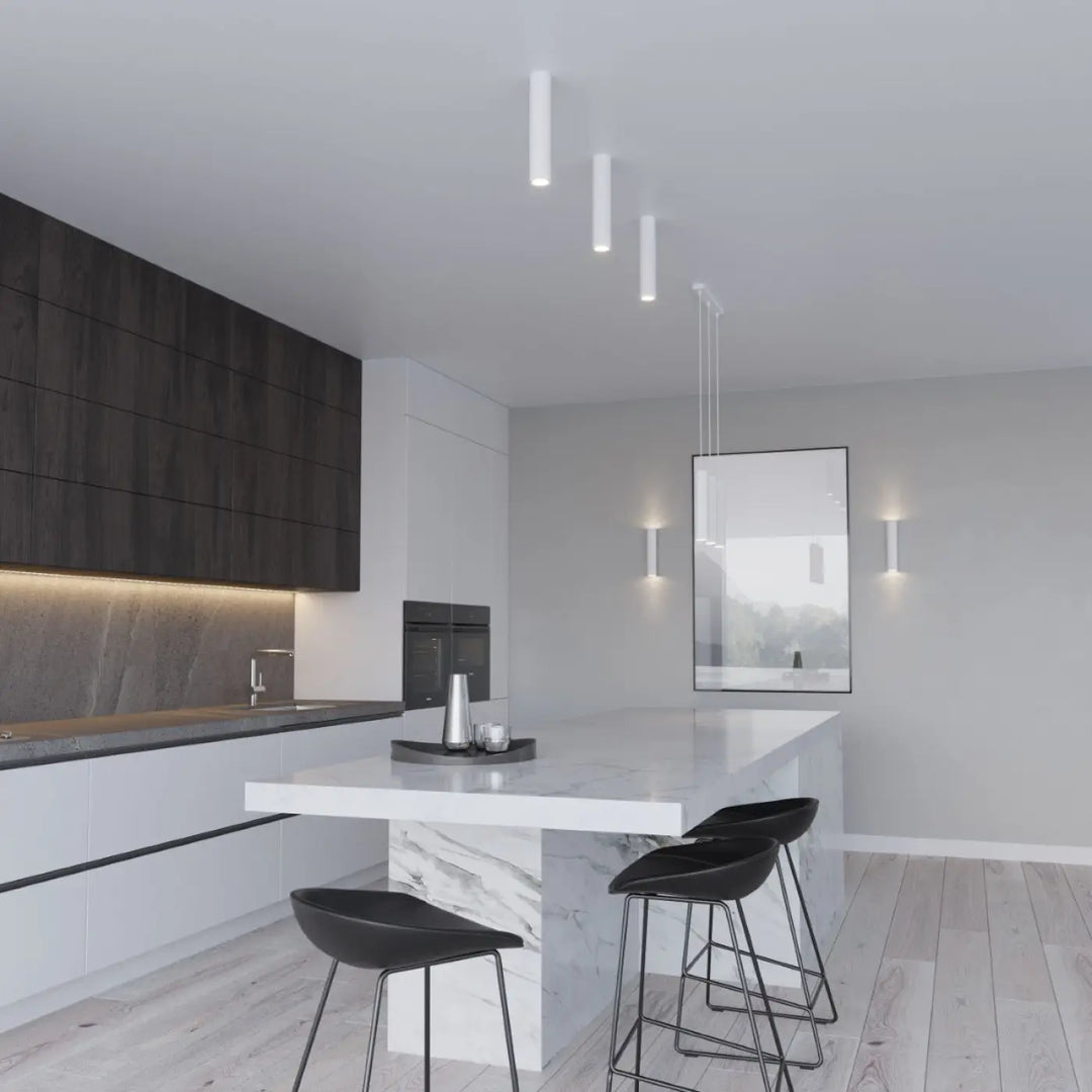 Modern black bar stools with sleek metal legs complement the plafonnier lagos blanc for élégance moderne and lumière fonctionnelle