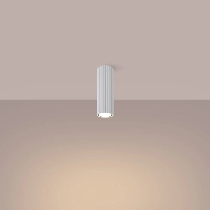 Plafonnier karbon blanc cylindrique avec rainures verticales et ampoules gu10 interchangeables design minimaliste
