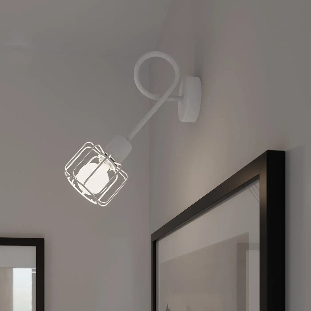 Applique murale blanche style loft collection beluci avec bras courbé et abat-jour cage en métal