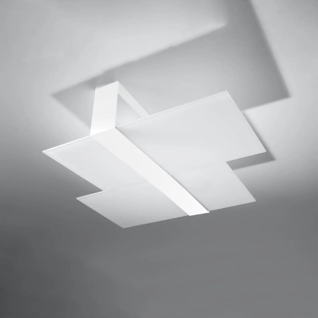 Plafonnier fonctionnel design intemporel blanc met magnifiquement en valeur le luminaire plafonnier massimo blanc