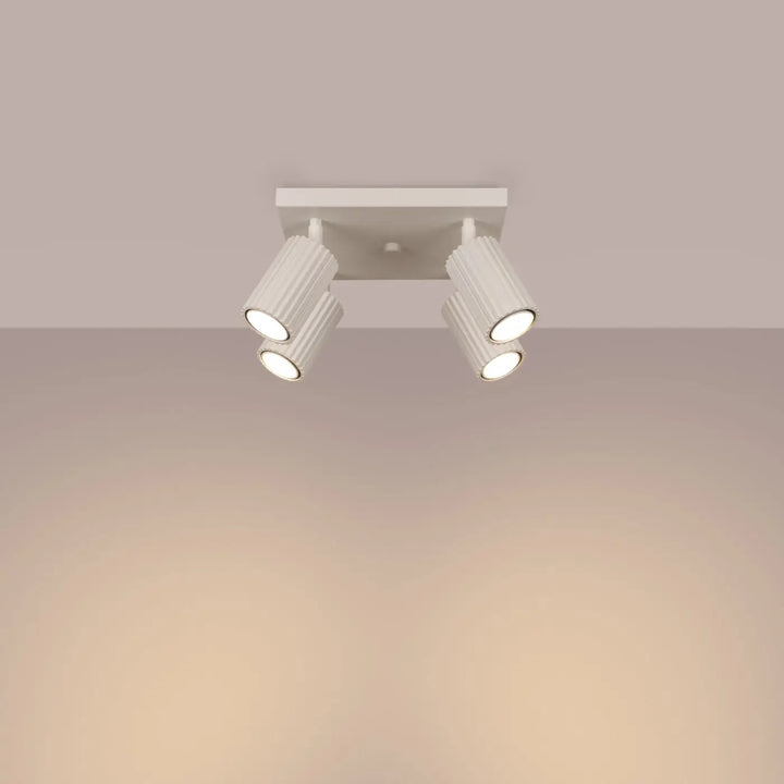 Plafonnier karbon beige avec quatre têtes cylindriques réglables à ampoules gu10 interchangeables design minimaliste