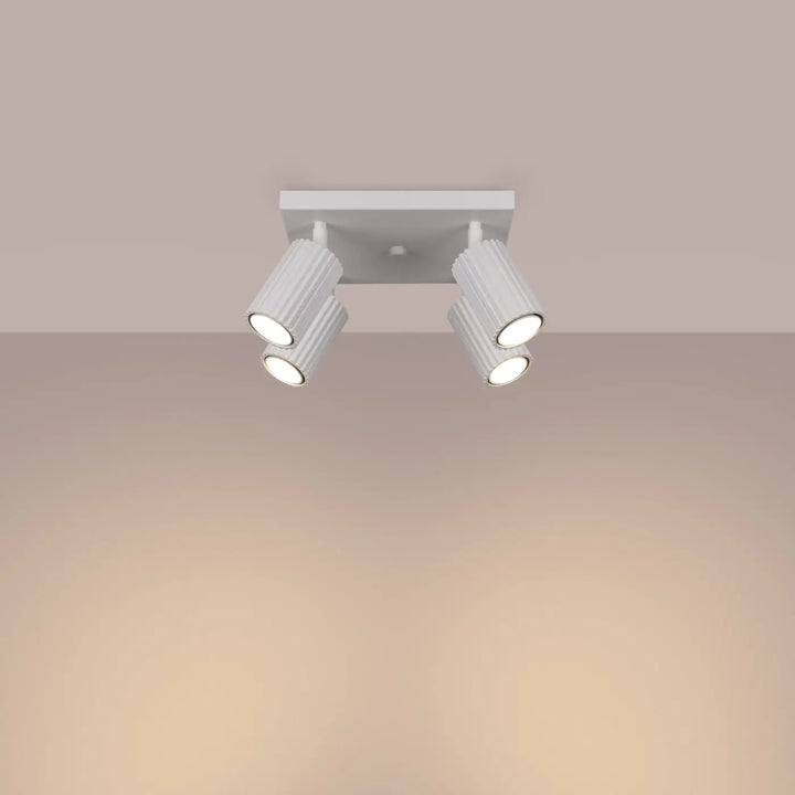 Plafonnier karbon allie avec trois têtes cylindriques réglables blanc design minimaliste et ampoules gu10 interchangeables