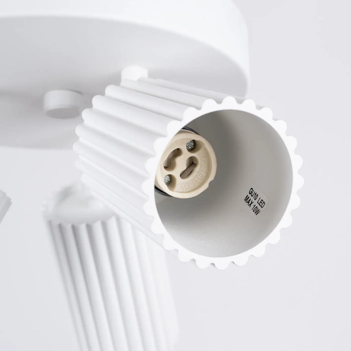 Plafonnier karbon allie design minimaliste en céramique blanche avec ampoules gu10 interchangeables et contour festonné