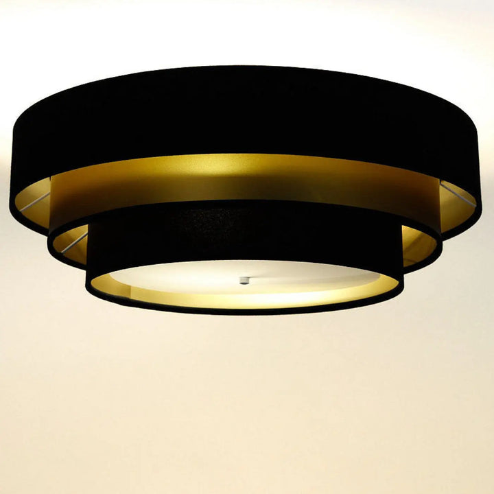 Luminaire plafonnier bleu marine avec design circulaire moderne en noir et doré pour une ambiance élégante