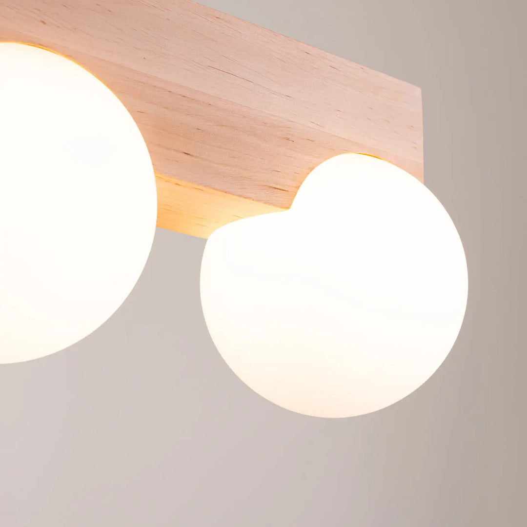 Luminaire plafonnier bulbo 2 en bois naturel avec deux globes en verre dépoli forme minimaliste et combinaison naturelle