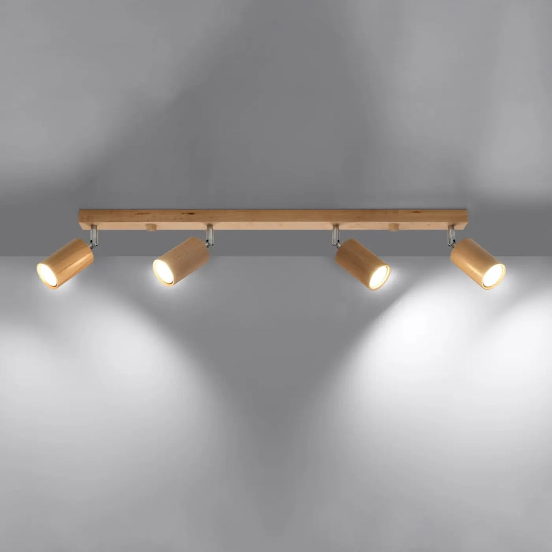 Luminaire plafonnier berg 4 en bois naturel avec quatre abat-jours mobiles berg cylindriques et forme simple