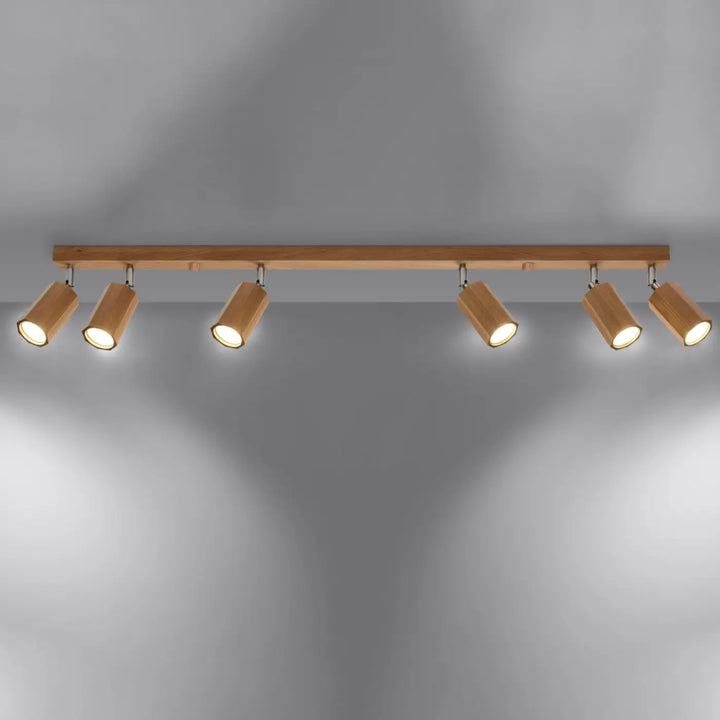 Plafonnier zeke en bois clair avec cinq spots cylindriques réglables lampe zeke bois s’intégrera parfaitement