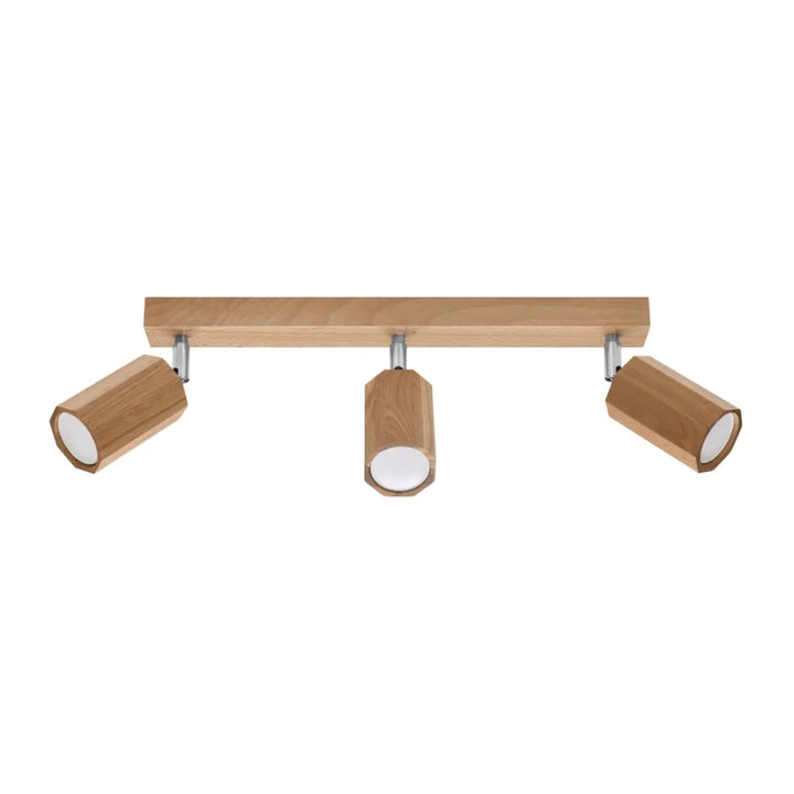 Luminaire plafonnier zeke 3 en bois clair avec trois têtes cylindriques hexagonales qui s’intégrera parfaitement