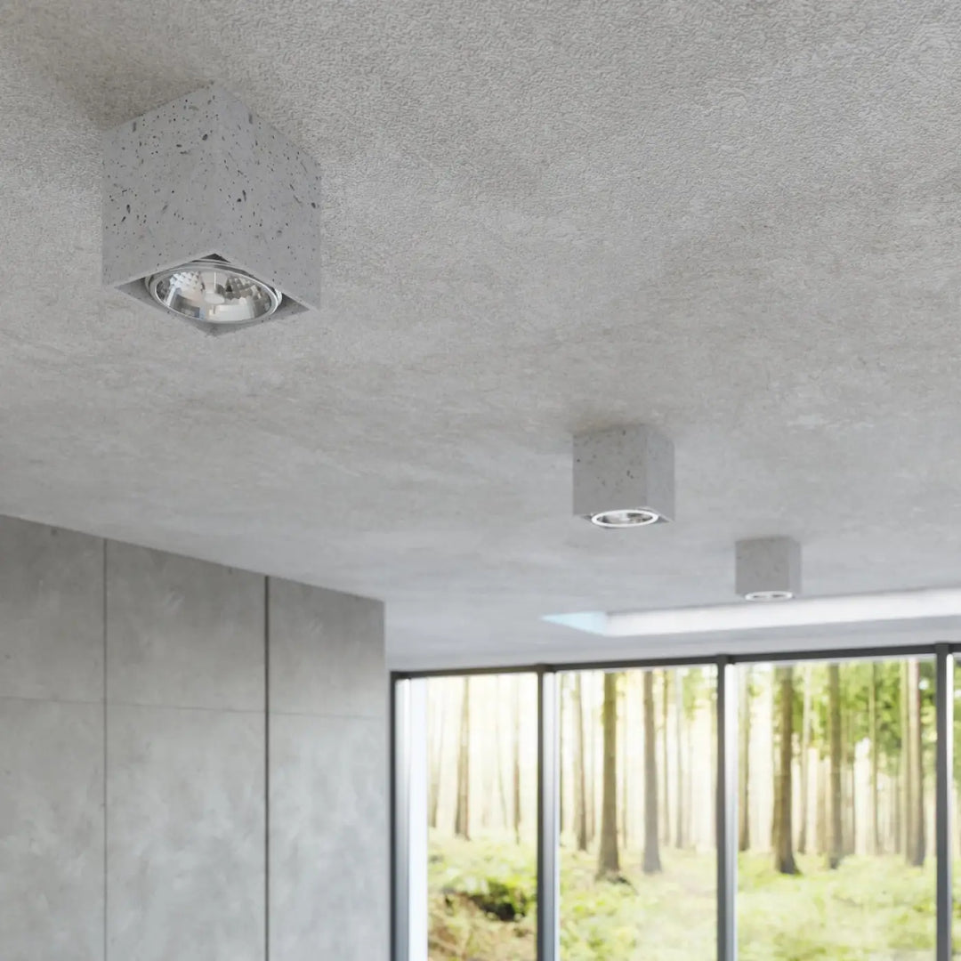 Plafonnier valde en béton durable avec centre métallique réfléchissant facile à nettoyer pour éclairage moderne
