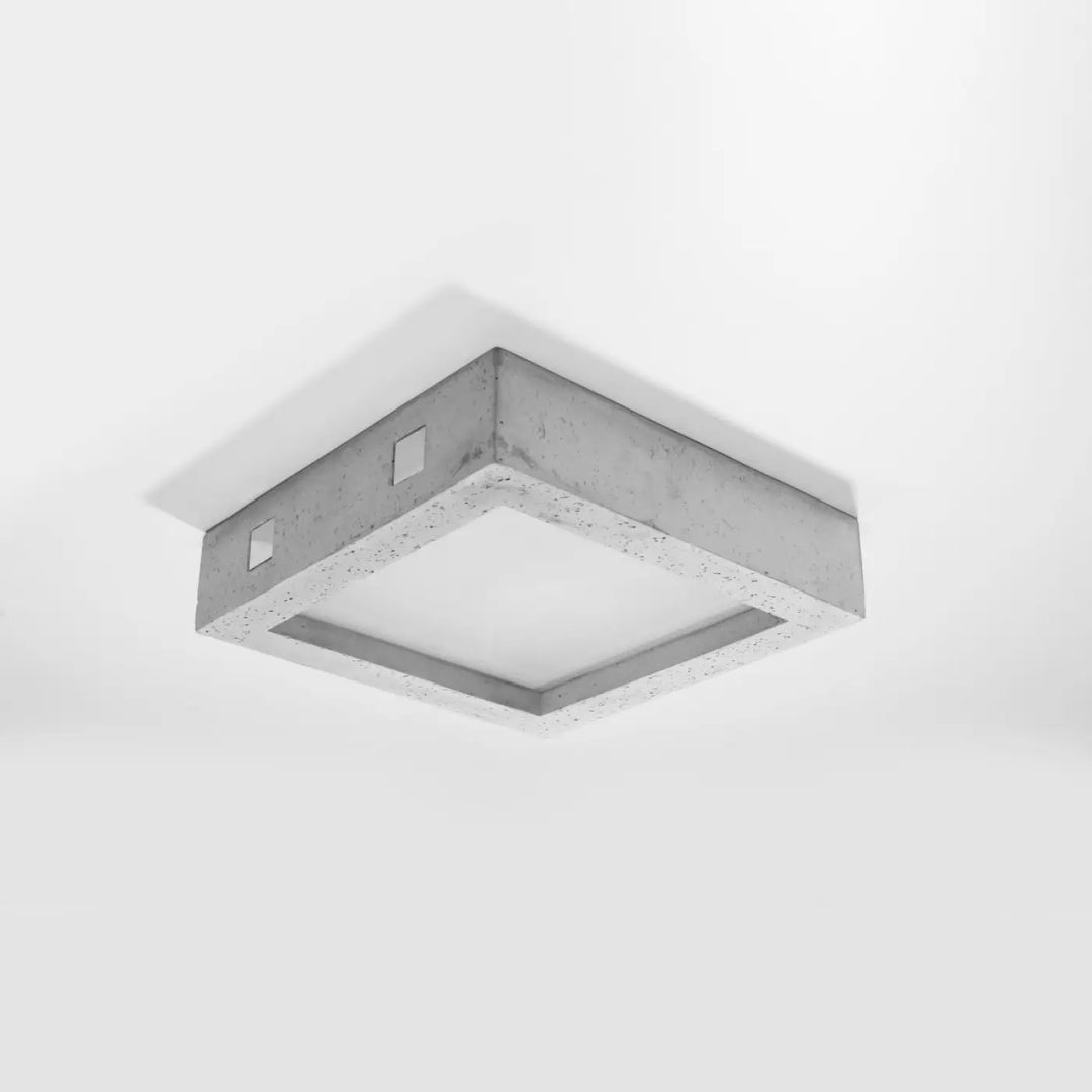 Luminaire plafonnier riza en béton moderne avec finition grise texturée pour un aménagement industriel harmonieux