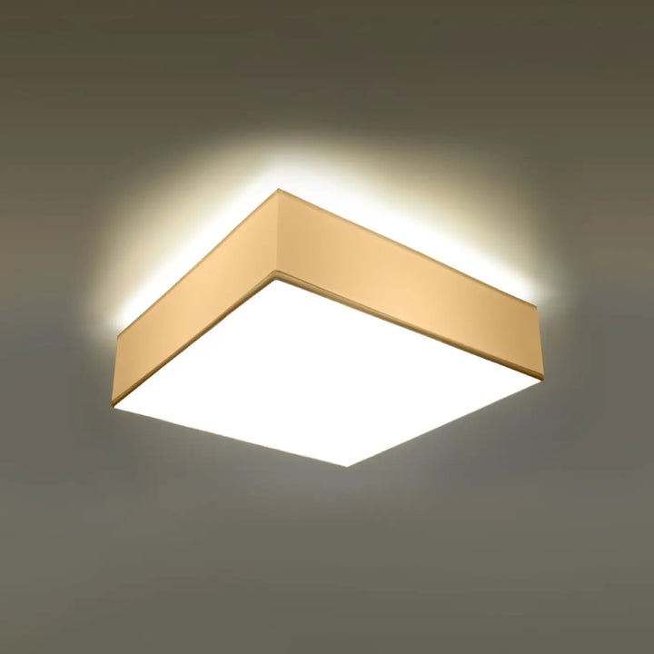 Plafonnier carré horus 55 avec cadre or chaud et panneau lumineux blanc pour éclairage polyvalent et forme riche