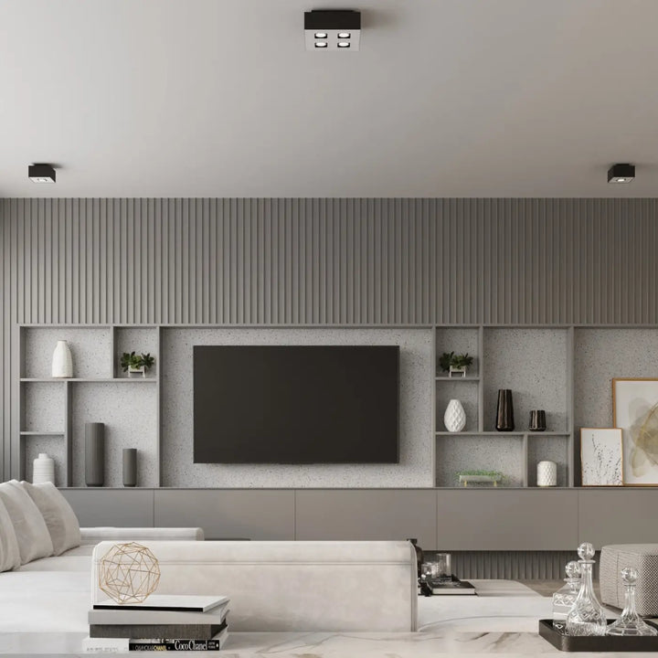 Plafonnier moderne mono noir avec quatre spots allongés intégrés pour un éclairage contemporain