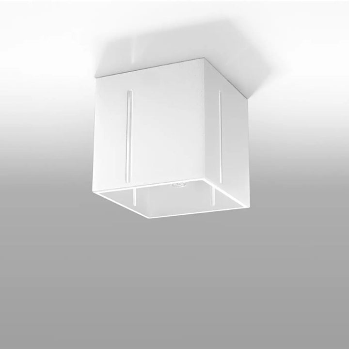 Plafonnier pixar blanc avec design minimaliste et perforation linéaire offrant un spectacle lumineux subtil