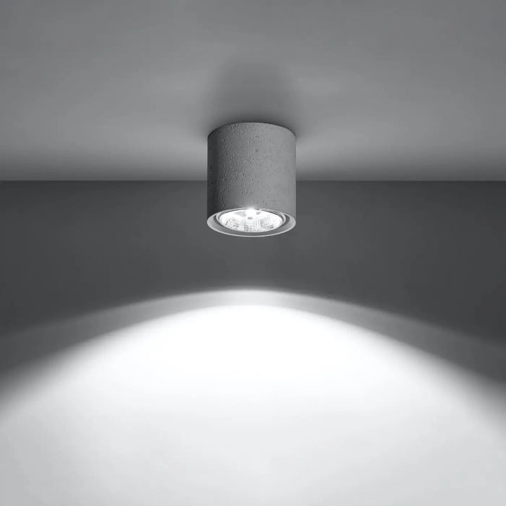 Luminaire plafonnier béton cullo forme simple avec led intégrée en béton durable émettant une lumière blanche brillante
