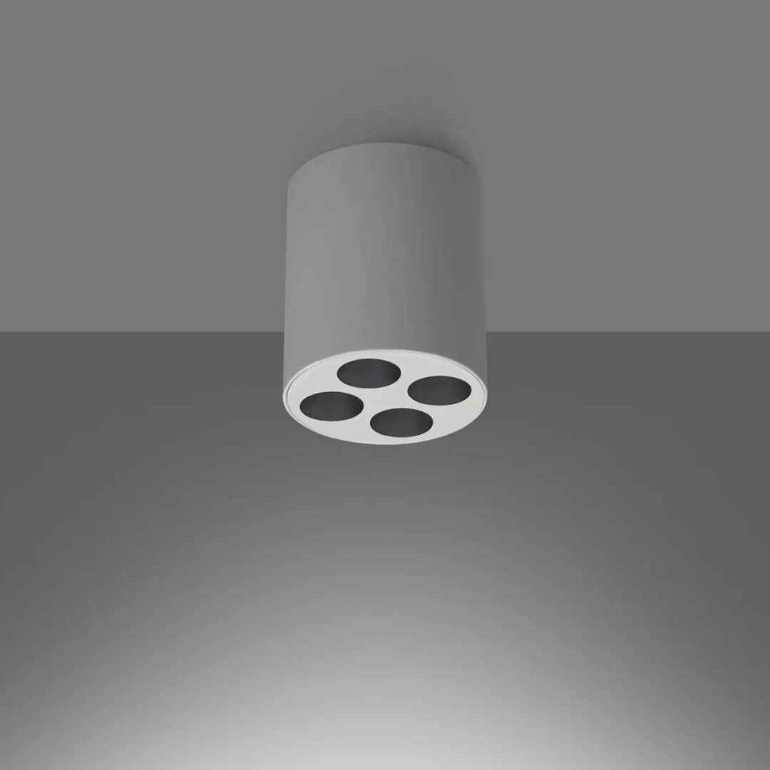 Luminaire plafonnier zoe led blanc avec design moderne et quatre découpes circulaires pour une combinaison parfaite