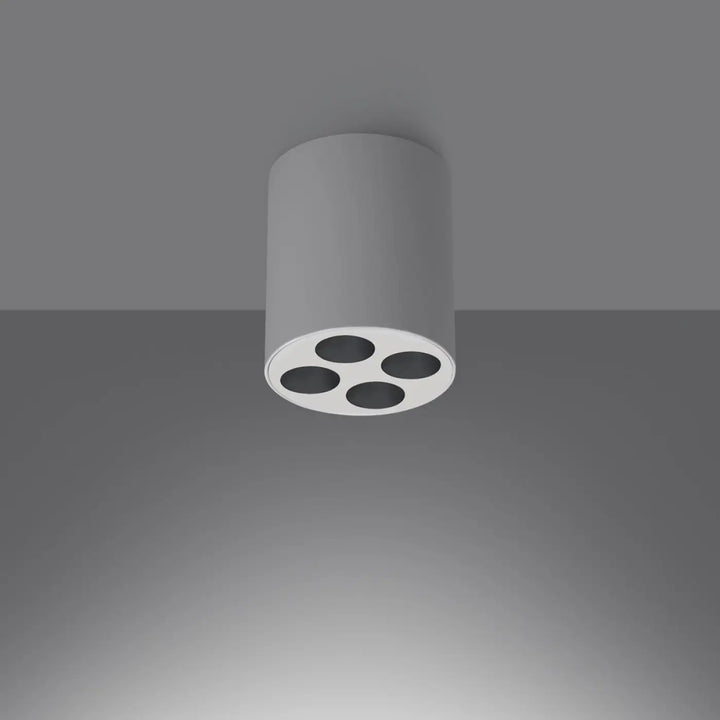Luminaire plafonnier zoe led blanc avec design moderne et quatre découpes circulaires pour une combinaison parfaite