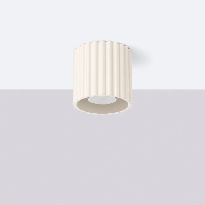 Luminaire plafonnier aura 1 beige en forme unique inspirée avec design cylindrique crème et rainures verticales modernes