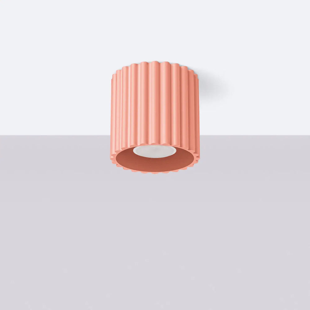 Luminaire plafonnier aura 1 peach corail cylindrique avec forme unique inspirée et finition mate à rainures verticales