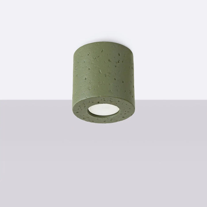 Plafonnier orbis vert olive en béton cylindrique texturé avec led encastrée design contemporain