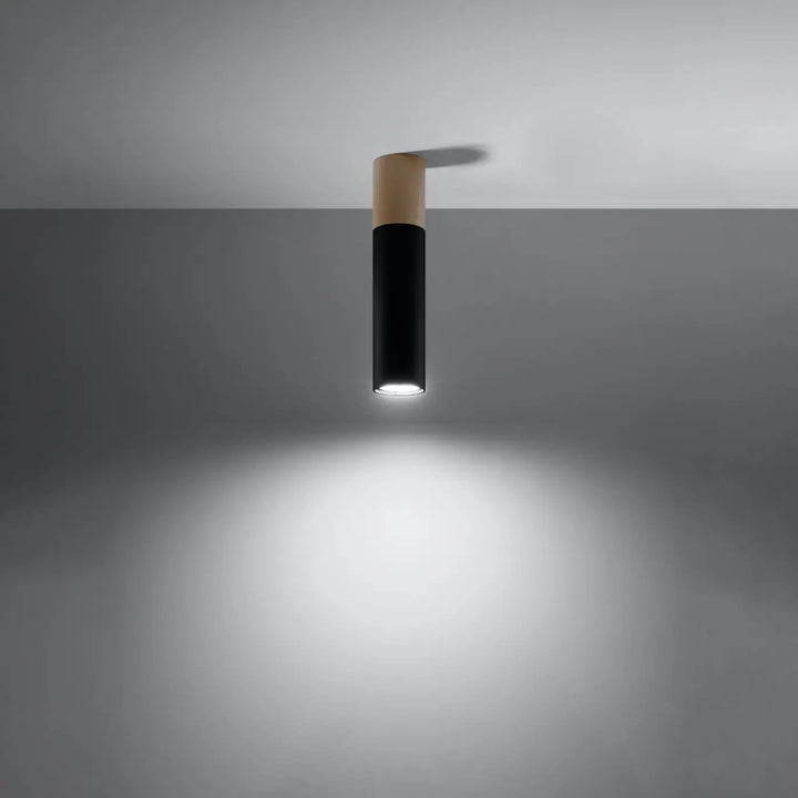 Luminaire plafonnier moderne pablo noir avec corps cylindrique mat et top en bois naturel émettant lumière blanche ciblée