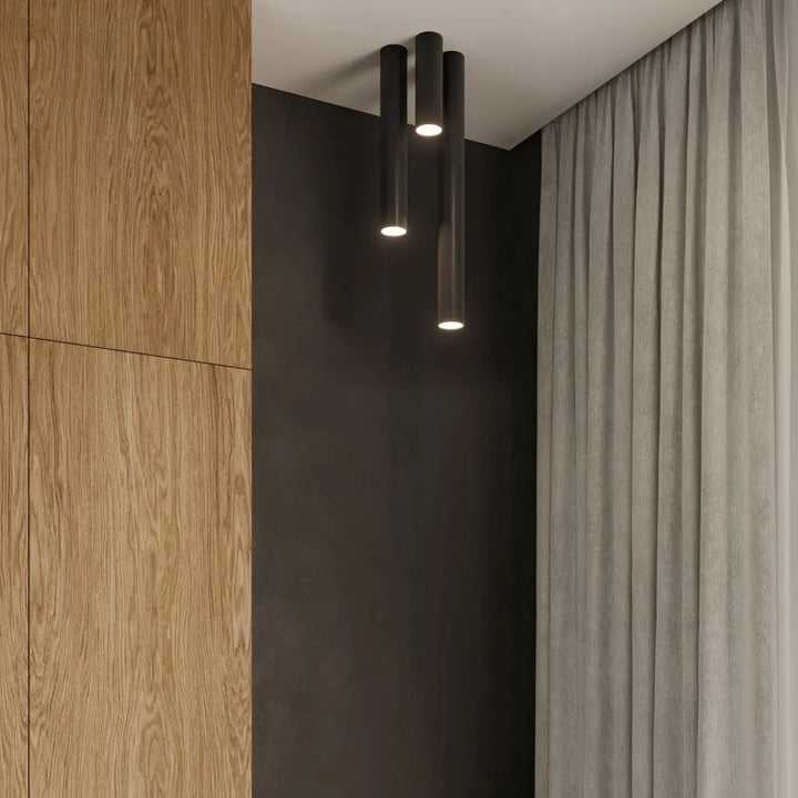 Plafonnier lagos 40 noir avec trois luminaires cylindriques élégance moderne et lumière fonctionnelle chaude
