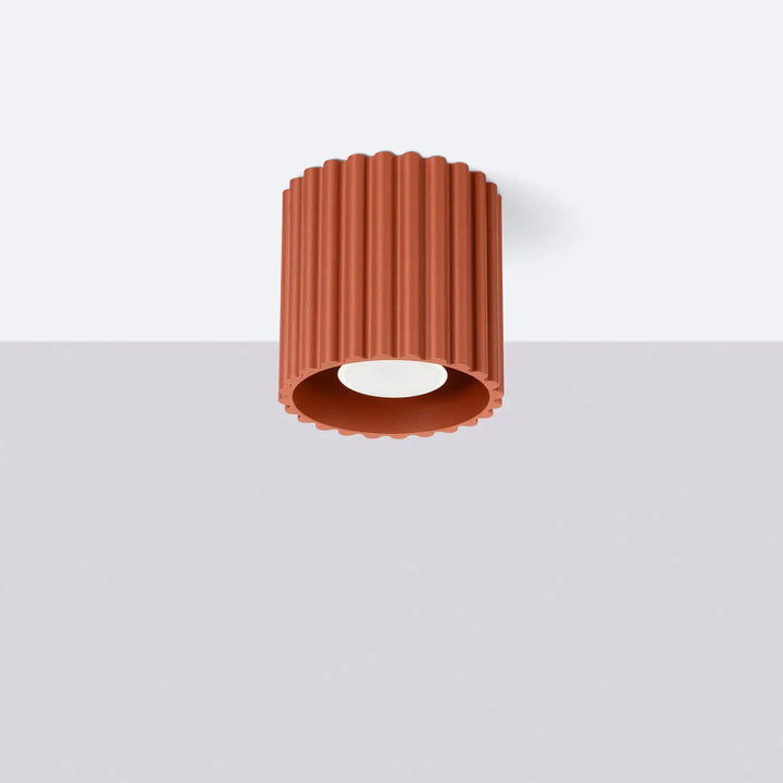 Luminaire plafonnier aura 1 rouge ochra en forme unique inspirée avec extérieur cannelé terracotta et intérieur blanc lisse