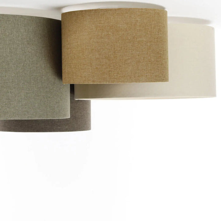 Set de trois abat-jours cylindriques en tissu naturel texturé aux tons terre pour luminaire plafond boho élégant