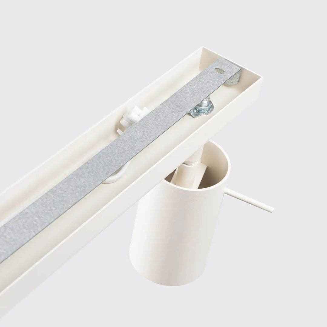 Luminaire plafonnier ring 3l beige avec track métallique gris et base cylindrique pour éclairage flexible minimalisme moderne