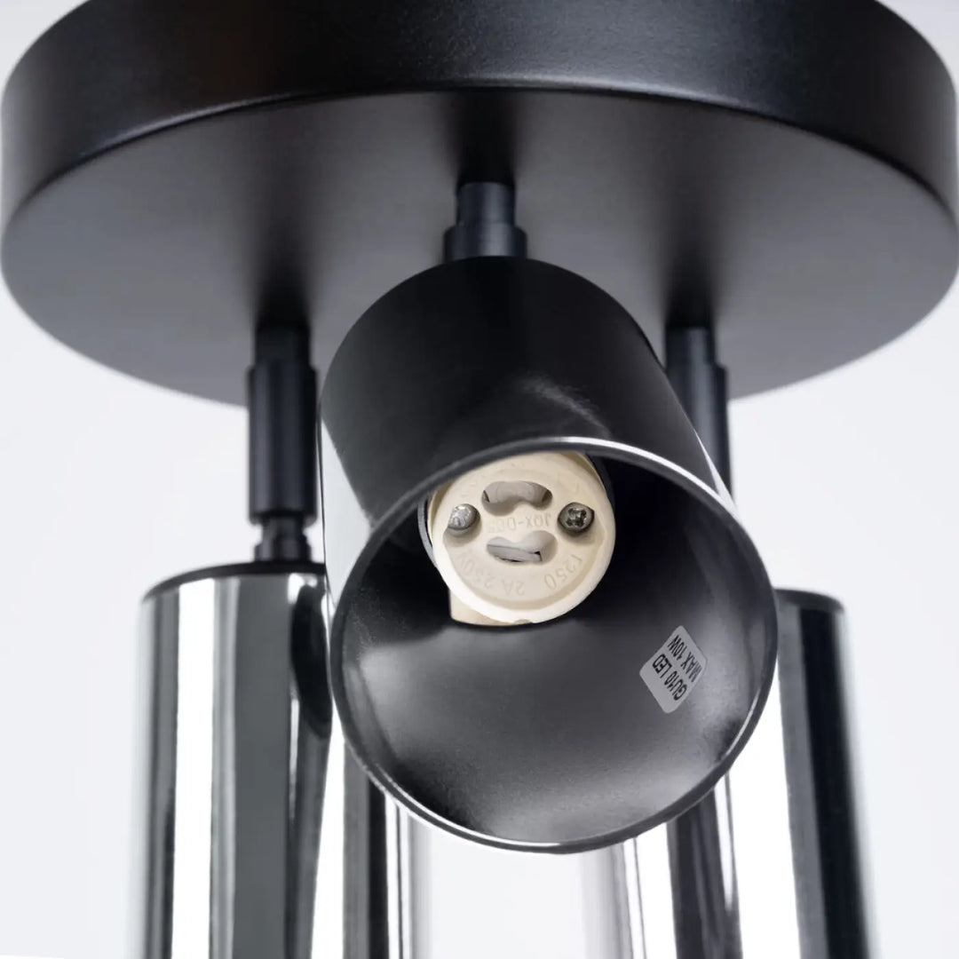 Plafonnier winx 3p noir avec finition mate noire, abat-jours cylindriques et accents chrome design moderne