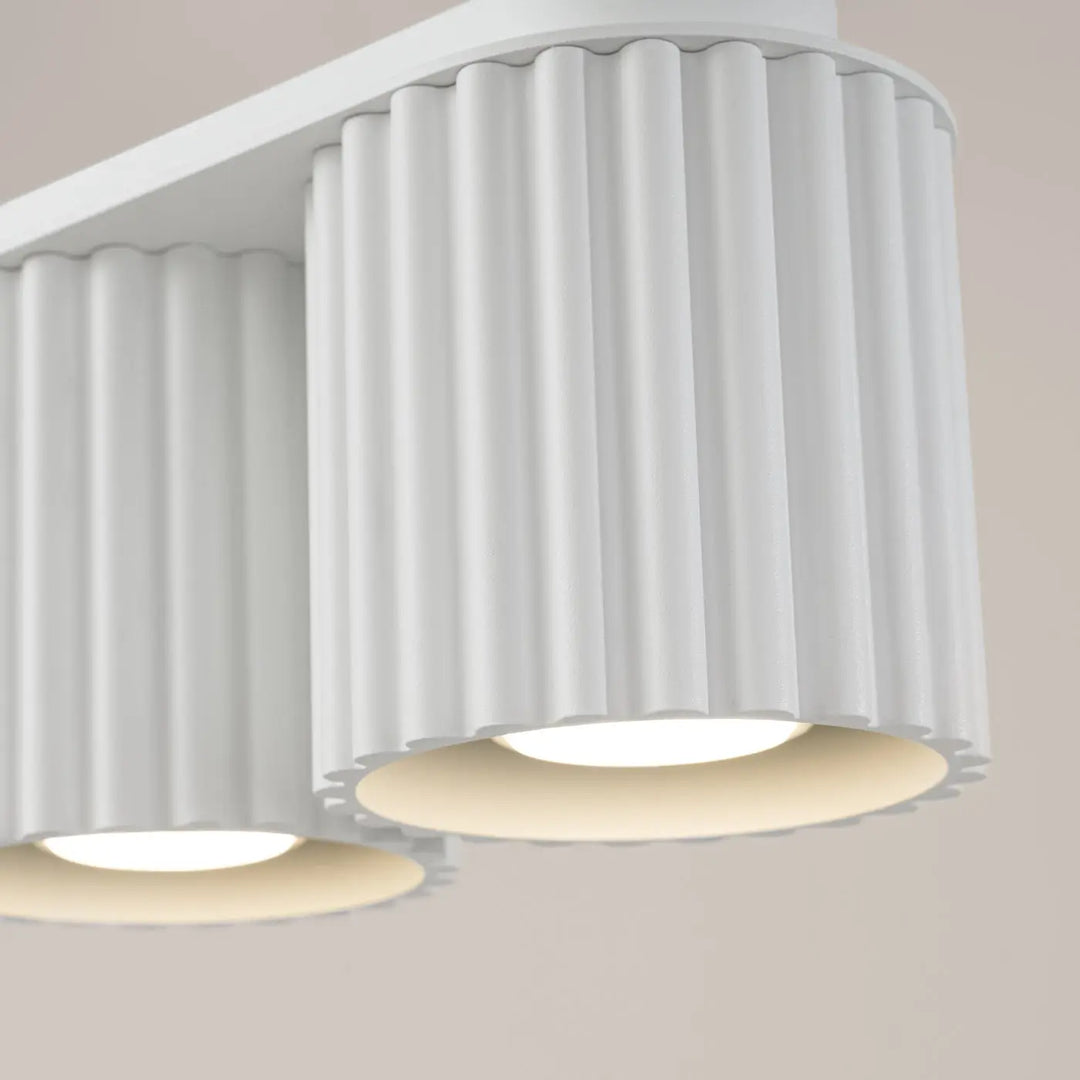 Luminaire plafonnier aura 2 blanc avec forme unique inspirée et design minimaliste en blanc moderne fluté