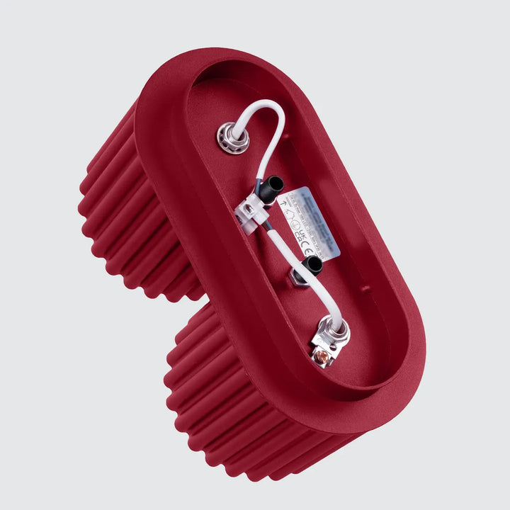 Luminaire plafonnier aura 2 bordeaux en led rouge ovale avec forme unique inspirée et texture nervurée visible