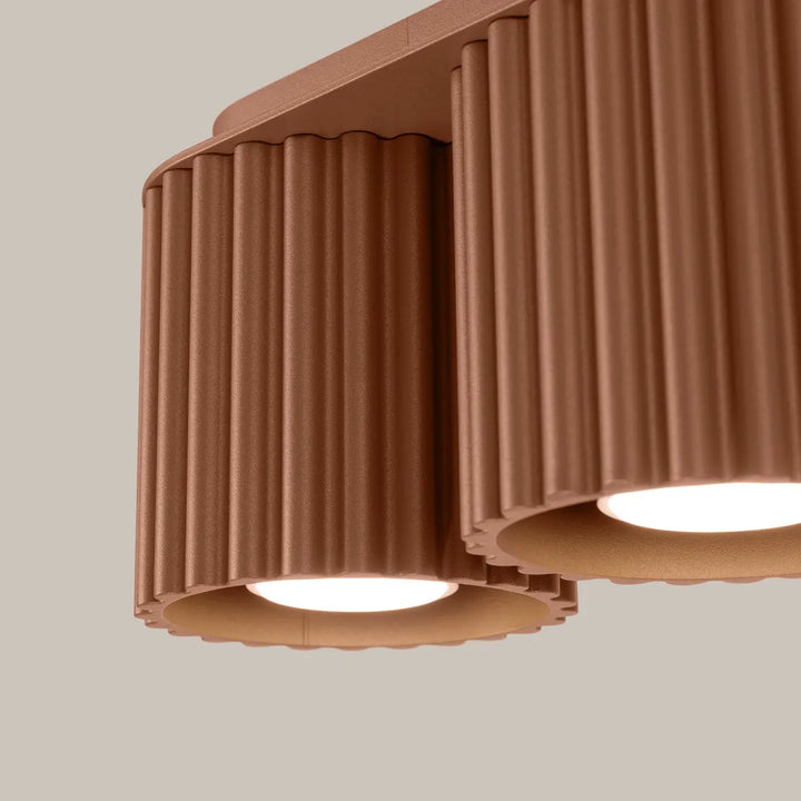 Luminaire plafonnier aura 2 moka en cuivre avec forme unique inspirée et abat-jour cylindrique cannelé led intégrées