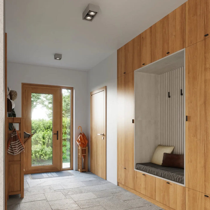 Luminaire plafonnier béton quatro avec unité de rangement intégrée en bois clair et mur à lames verticales sentez mieux