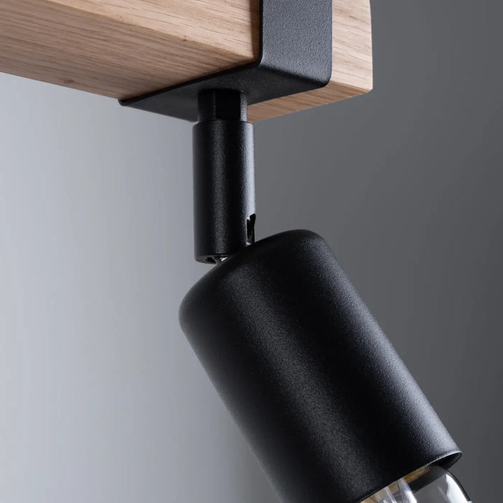 Luminaire plafonnier série zuca 2 noir avec tête cylindrique noire mate et support en bois pour ampoules décoratives visibles