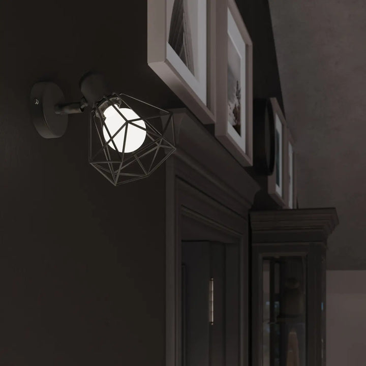 Luminaire plafonnier série artemis noir en métal avec cage géométrique créera une atmosphère intime élégante