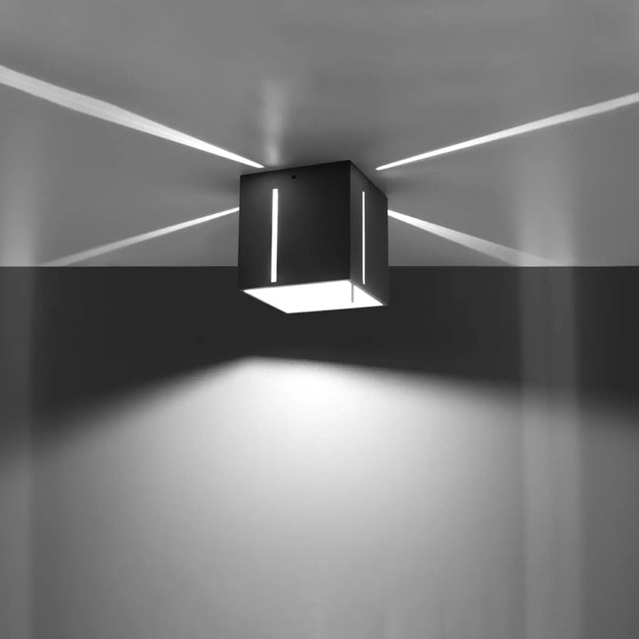 Luminaire plafonnier pixar gris avec perforation linéaire dispersera un spectacle lumineux élégant et moderne