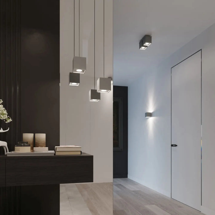Plafonnier quad gris monté individuellement avec luminaires carrés minimalistes et éclairage led chaud pour magnifique décoration