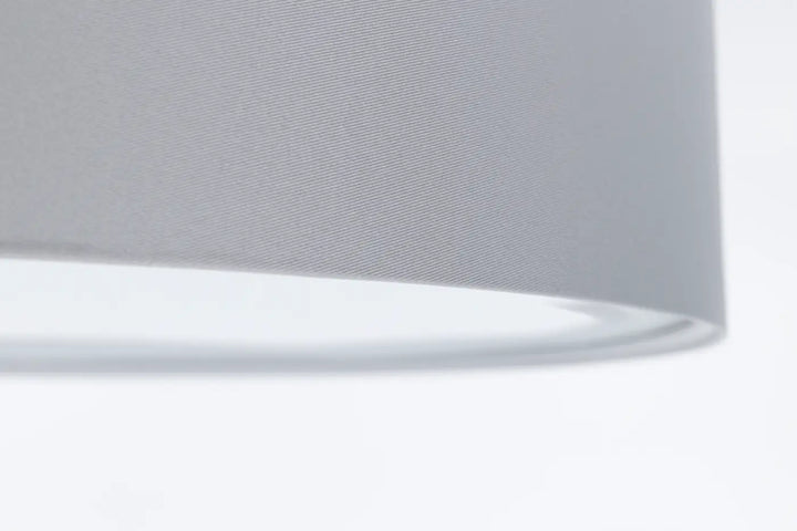 Luminaire plafonnier gris avec abat-jour en tissu gris platine à texture tissée subtile