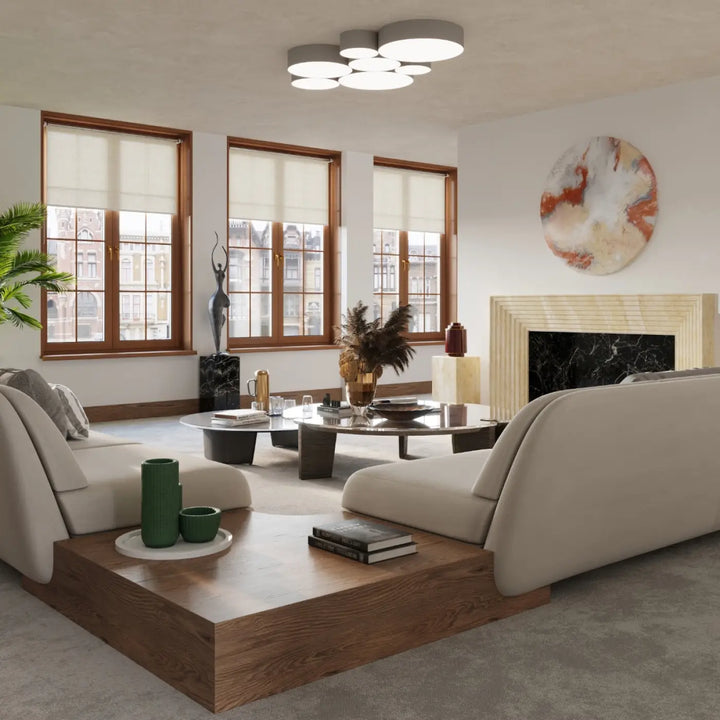 Luminaire plafonnier arena 55 gris avec éclairage polyvalent et forme riche complété par un canapé sectionnel beige en tissu