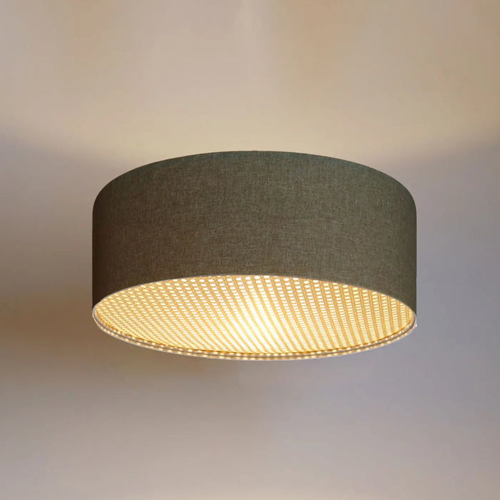 Luminaire plafonnier boho elegant gris vert with a dark gray textured fabric shade and warm golden led glow inside