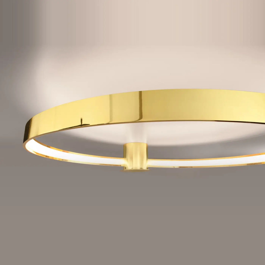 Luminaire plafonnier or poli design unique avec modules led intégrés pour libre cours à une ambiance moderne et élégante