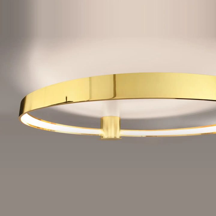 Luminaire plafonnier or poli design unique avec modules led intégrés pour libre cours à une ambiance moderne et élégante
