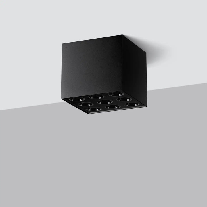 Plafonnier ozzy noir mat avec neuf led circulaires en grille design moderne et combinaison parfaite pour intérieur contemporain