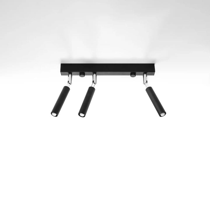Plafonnier moderne eyetech noir avec trois spots cylindriques réglables en style industriel d’ambiance loft